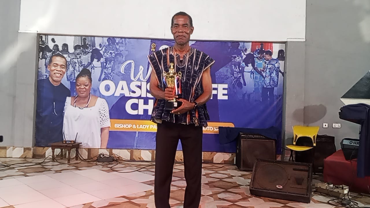 Winning Life Academy representative receiving an award